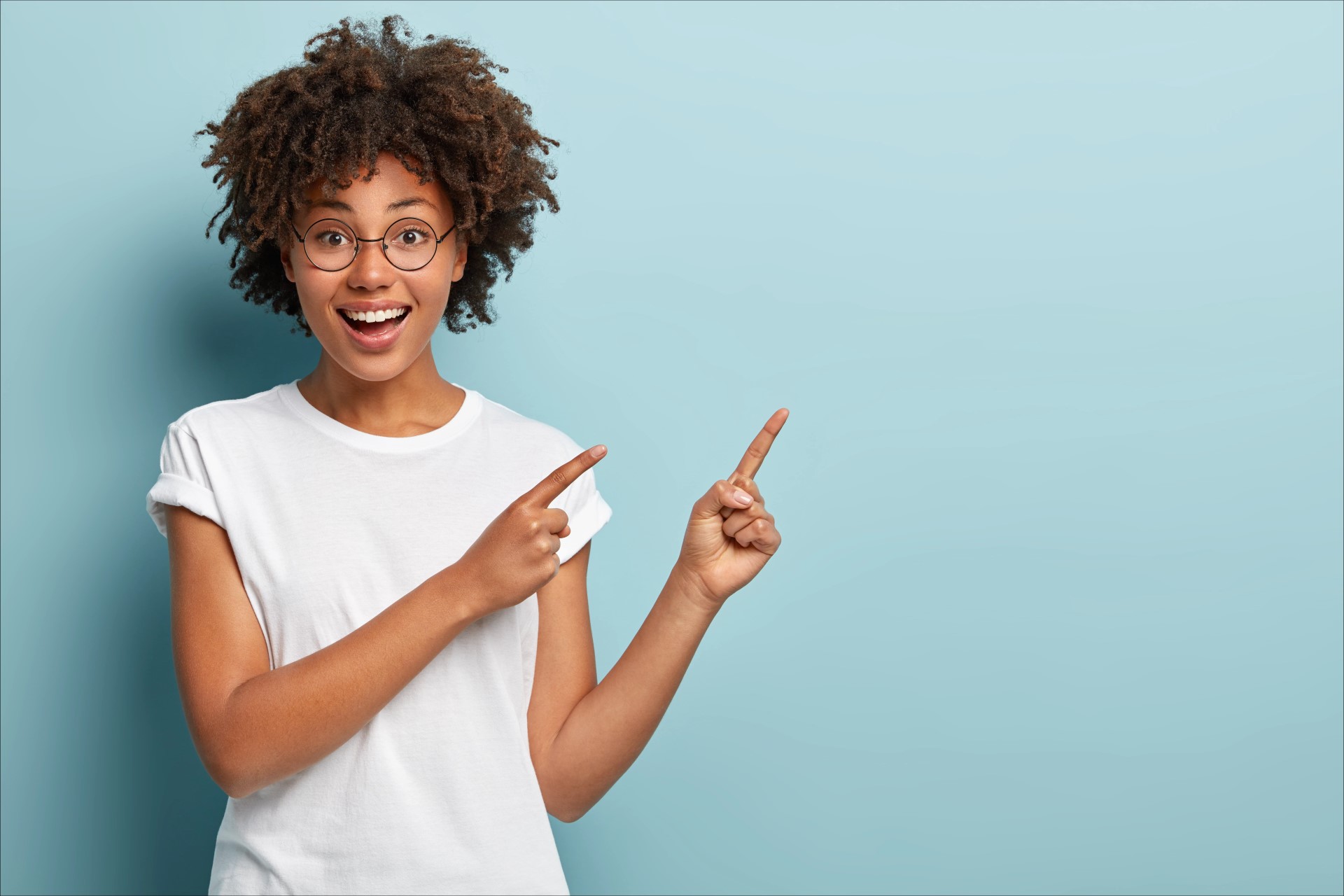 woman pointing right